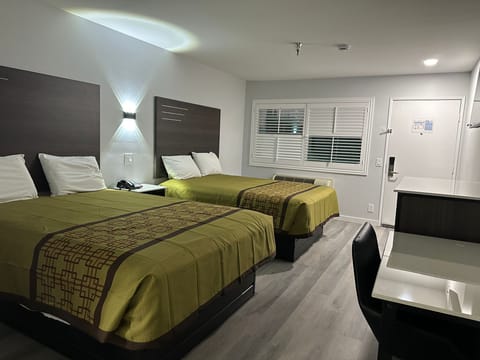 Deluxe Double Queen Room | Desk, laptop workspace, free WiFi