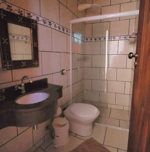 Shower, towels, soap, toilet paper