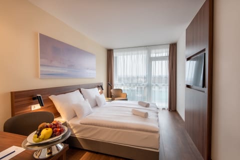 Panoramic Double Room | Minibar, in-room safe, desk, blackout drapes