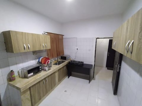 Economy Apartment, Balcony, City View | Private kitchen | Fridge, microwave, oven, stovetop