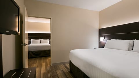 Suite, Multiple Beds, Mobility Accessible (Accessible Tub) | In-room safe, desk, laptop workspace, iron/ironing board