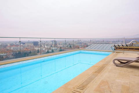 Outdoor pool, sun loungers