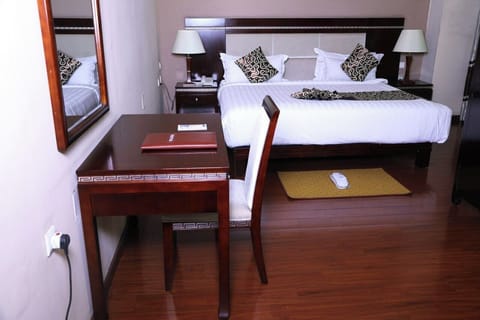 Standard Double Room, Balcony, City View | In-room safe, individually decorated, individually furnished, desk