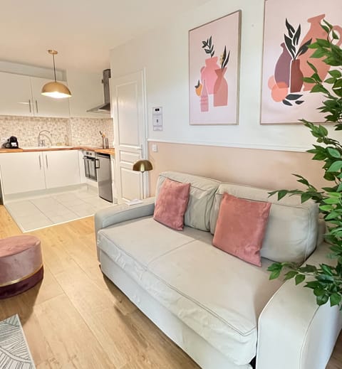 Deluxe Apartment, Garden View | Living area | 119-cm Smart TV with digital channels