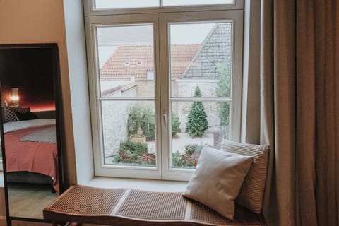 Deluxe Double Room, Garden View | Minibar, desk, blackout drapes, free WiFi