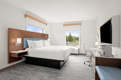 Premium bedding, desk, laptop workspace, free WiFi