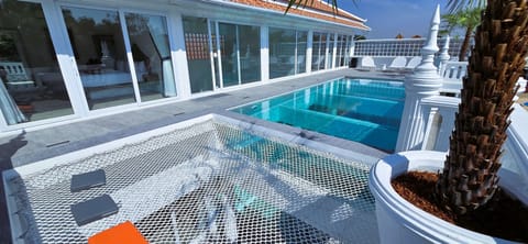 Outdoor pool, sun loungers