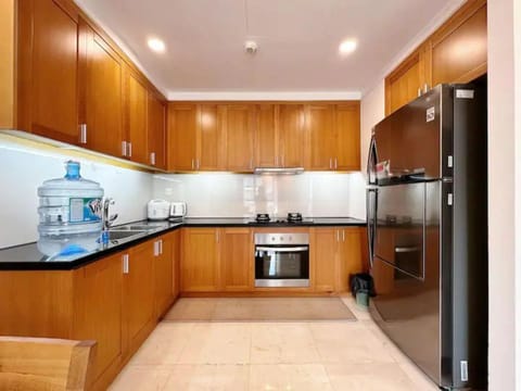 Deluxe Apartment, 1 Bedroom, City View | Private kitchen | Fridge, stovetop