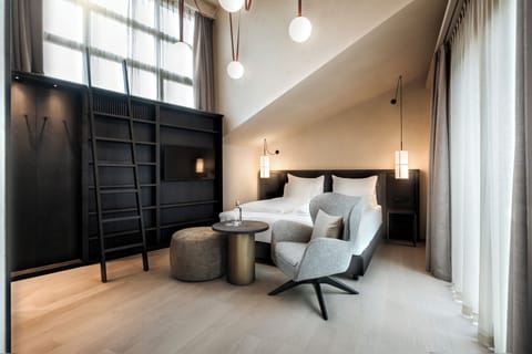 Junior Suite, Balcony, Courtyard View | Premium bedding, Select Comfort beds, free minibar items, in-room safe