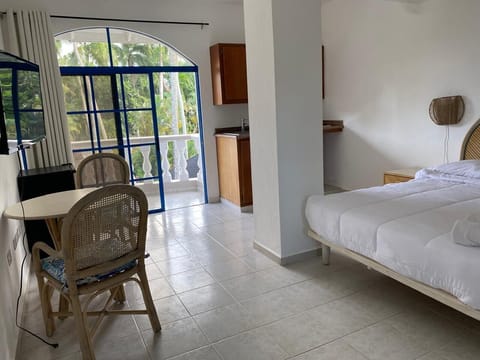 Single Room, Balcony, Pool View | 1 bedroom, in-room safe, laptop workspace, blackout drapes
