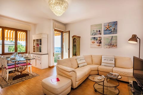 Apartment, Balcony | Living area | 32-inch TV with digital channels