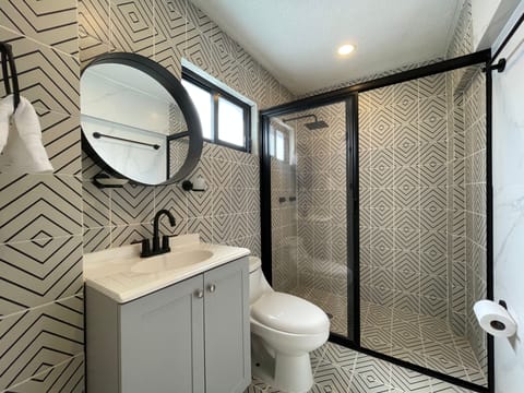 Double Room | Bathroom | Shower, towels, soap, shampoo