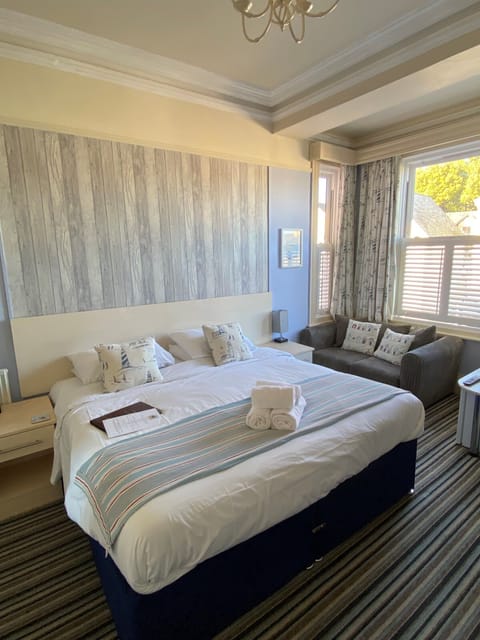Family Triple Room | Premium bedding, iron/ironing board, free WiFi, bed sheets