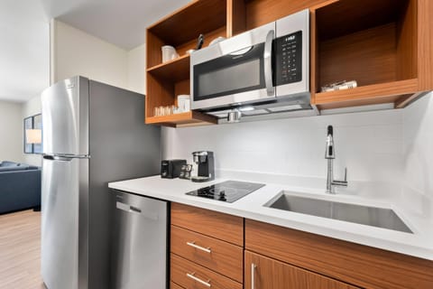 Desk, laptop workspace, blackout drapes, iron/ironing board