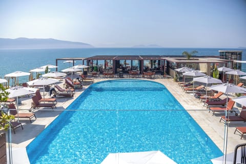 Outdoor pool, pool umbrellas, sun loungers