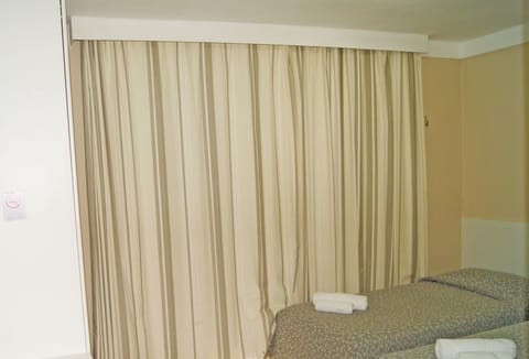 Standard Single Room | Minibar, desk, blackout drapes, bed sheets