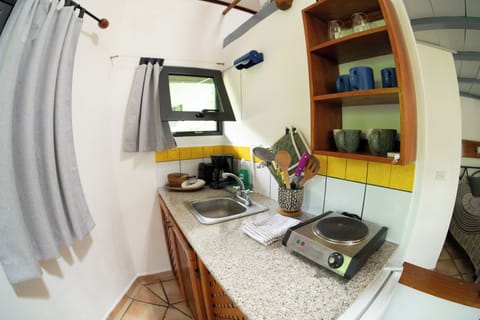 Cabin | Private kitchen | Full-size fridge, stovetop, coffee/tea maker, cookware/dishes/utensils