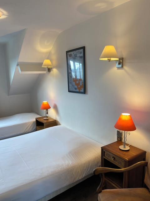 Family Triple Room, City View | Free WiFi, bed sheets