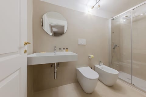 Junior Room, 2 Bedrooms | Bathroom | Shower, rainfall showerhead, hair dryer, bidet