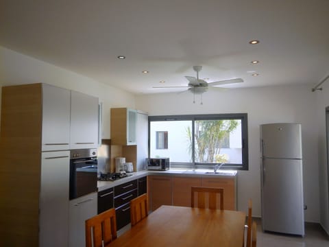 Two Bedroom Condo | Private kitchen | Fridge, microwave, stovetop, coffee/tea maker