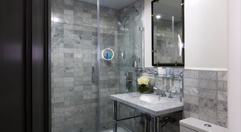 Combined shower/tub, designer toiletries, hair dryer, bathrobes