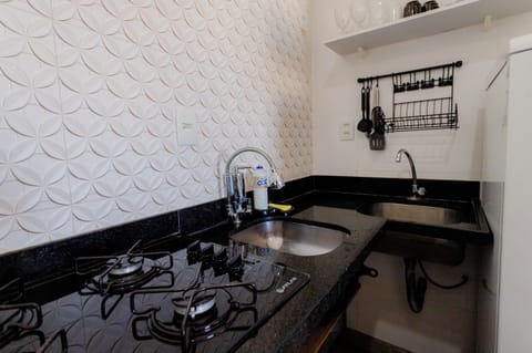 Basic Apartment | Private kitchen | Microwave, cookware/dishes/utensils