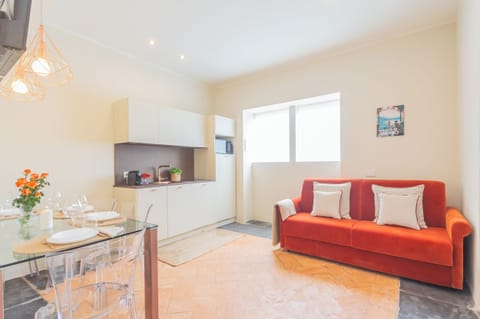 Apartment (1 Bedroom) | Living area | 32-inch Smart TV with cable channels