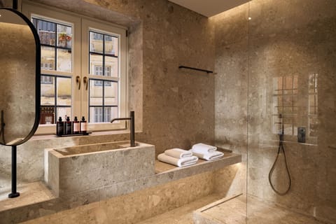 Deluxe Double or Twin Room, Ground Floor | Bathroom | Hair dryer, slippers, heated floors, towels