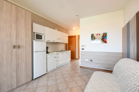 Superior Apartment, 1 Bedroom, 2 Bathrooms, Lake View | Living area | 32-inch TV with satellite channels, foosball, table tennis