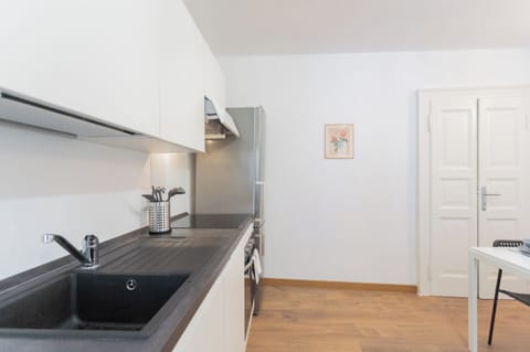 Apartment (2 Bedrooms) | Private kitchenette | Oven, espresso maker, electric kettle, highchair