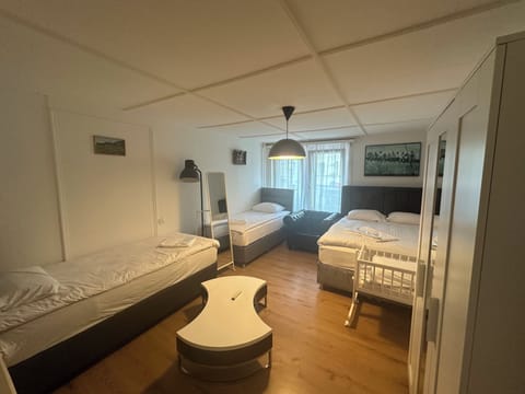 Classic Quadruple Room, City View | Soundproofing, iron/ironing board