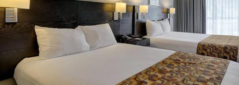 Deluxe Room, 2 Queen Beds | In-room safe, desk, blackout drapes, soundproofing