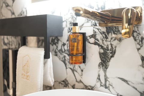 Deluxe Double Room, Partial Sea View | Bathroom | Free toiletries, hair dryer, bathrobes, slippers