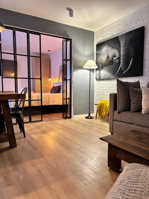 Junior Apartment | Living area | Flat-screen TV