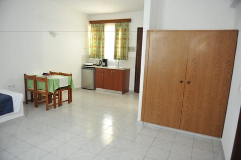 Apartment, 1 Bedroom | Private kitchen | Fridge, stovetop, coffee/tea maker, electric kettle