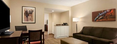 Premium Suite, 1 King Bed, Non Smoking | 1 bedroom, in-room safe, desk, iron/ironing board