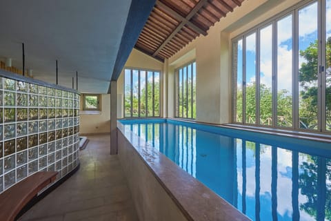 Indoor pool, seasonal outdoor pool, pool umbrellas, sun loungers