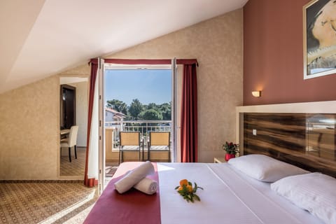 Family Quadruple Room, Partial Sea View | Terrace/patio