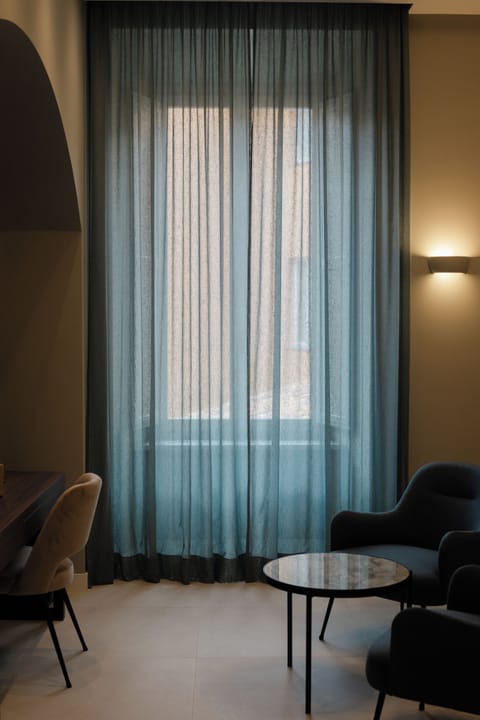 Junior Double or Twin Room, City View | In-room safe, desk, laptop workspace, blackout drapes