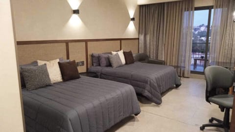 Classic Double Room, City View | Down comforters, in-room safe, desk, laptop workspace