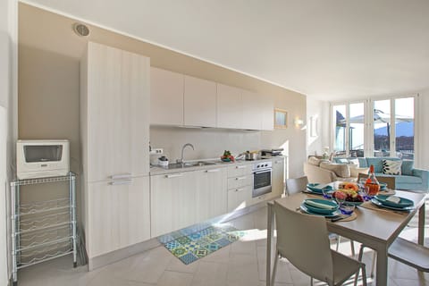Family Apartment, 2 Bedrooms, Lakeside (Sogno Sul Lago  Lake Front) | Private kitchen | Fridge, microwave, oven, stovetop