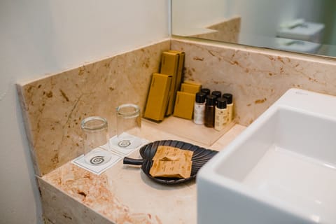 Junior Suite | Bathroom amenities | Eco-friendly toiletries, hair dryer, towels