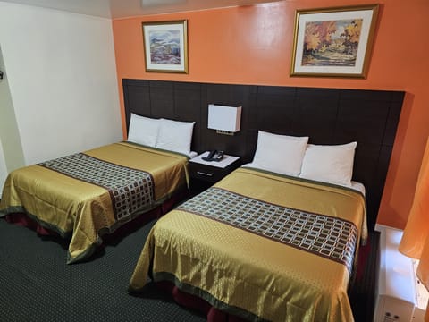 Standard Room, 2 Double Beds, Non Smoking | Blackout drapes, free WiFi, bed sheets