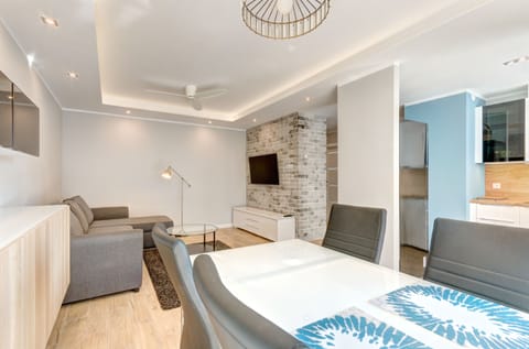 Apartment, 1 Bedroom, Balcony (4 adults) | Living area | 32-inch flat-screen TV with cable channels, TV