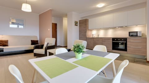 Comfort Apartment, Balcony (4 people) | Living room | 32-inch flat-screen TV with cable channels, TV