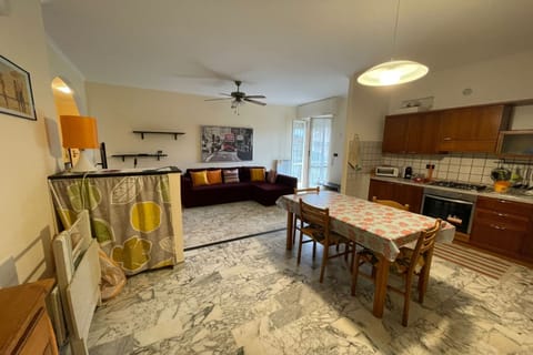 Family Apartment, 1 Bedroom, Mountainside (La Pietra sul Mare) | Living area | 21-inch flat-screen TV with satellite channels