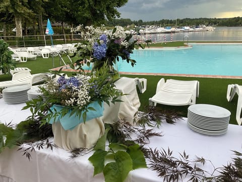 Seasonal outdoor pool, pool umbrellas, sun loungers