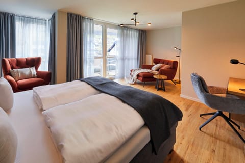 Deluxe Double Room, Balcony, Garden View | In-room safe, blackout drapes, free WiFi, bed sheets