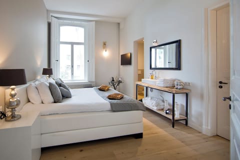 Deluxe Double Room | In-room safe, desk, laptop workspace, blackout drapes