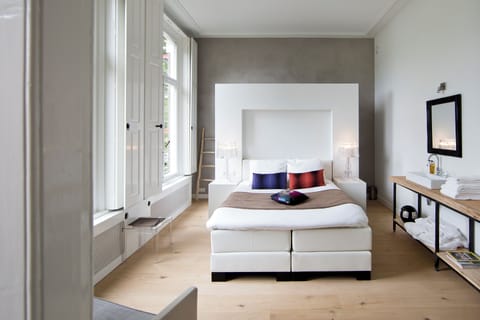 Deluxe Double Room | In-room safe, desk, laptop workspace, blackout drapes